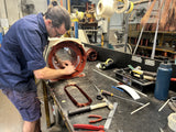 Electric motor stator being rewound with copper windings at the Perth Rewind workshop